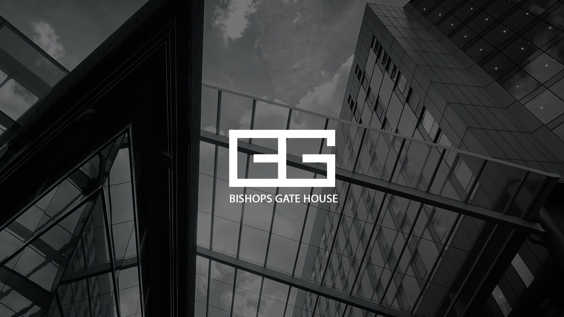Bishopsgate House B+G logo over a glass tower
